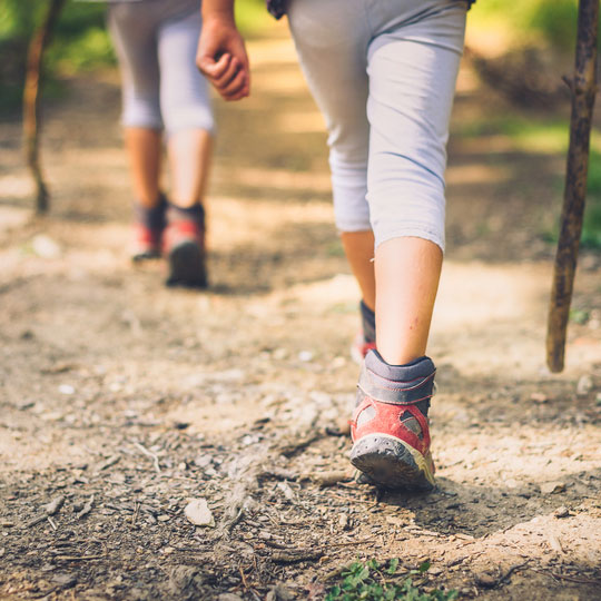 hikers on dirt path