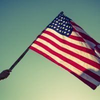 Arm holding American Flag