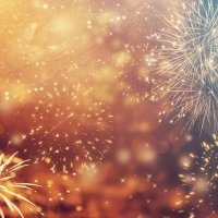 Golden colored fireworks in sky