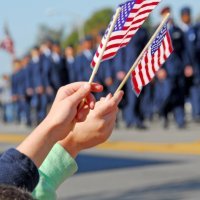Handheld American Flags at Parade