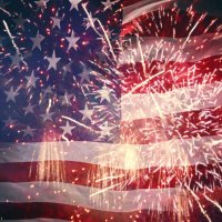 American Flag with Fireworks in foreground