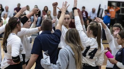 Storm Volleyball Team in Huddle