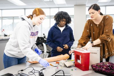 Medical Laboratory Technology Students With Instructor