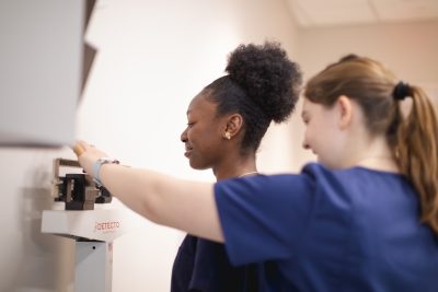 Medical Assisting students check vitals