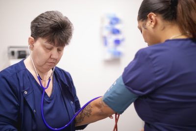 Medical Assisting students check vitals