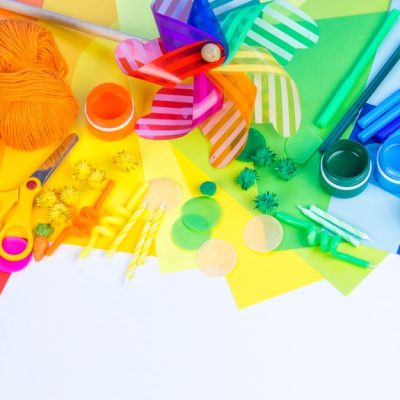 Decor,For,Carnival,And,Parties.,Paper,Craft.,Material,And,Tool Assorted colorful craft supplies on vibrant papers.