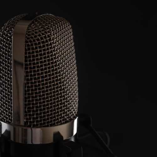 Studio,Professional,Microphone,Close-up,On,A,Black,Background,For,An Studio,Professional,Microphone,Close-up,On,A,Black,Background,For,An